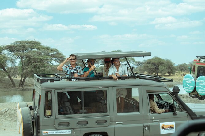 4 Days lodge safari Tarangire , Ngorongoro crater & Walking - Day 2: Tarangire National Park Game Drives for Elephants, Baobabs, and River Action
