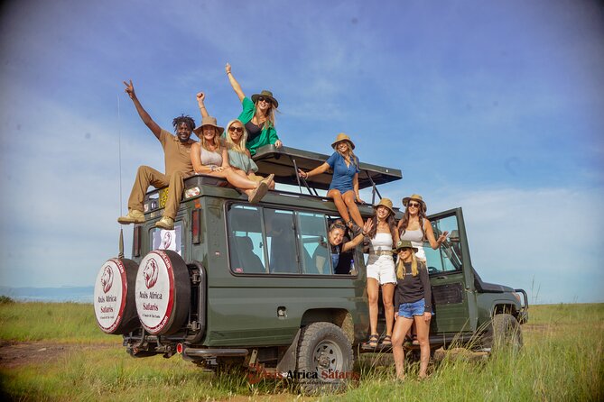 4 Days Safari Adventure Masai Mara and Nakuru Park Group - Day 1 in the Masai Mara: Narok Town, lunch, and the late-afternoon drive