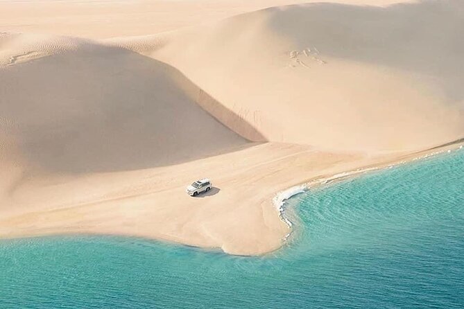 4hr Desert Safari: Sunset,Sunrise,Camel,Sand boarding,Inland Sea - Inland Sea Beach: Saudi Border Views and a Real Reset