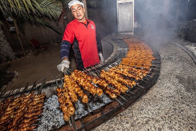 4X4 Dubai Desert Safari with BBQ Dinner and Lot More - Tanura, fire, and belly dancing shows during the evening