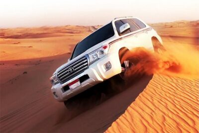 6-Hour Dubai Desert Dinner Safari with Dune Bashing & Camel Ride - Dune bashing, quad biking, and sandboarding: the real adrenaline mix
