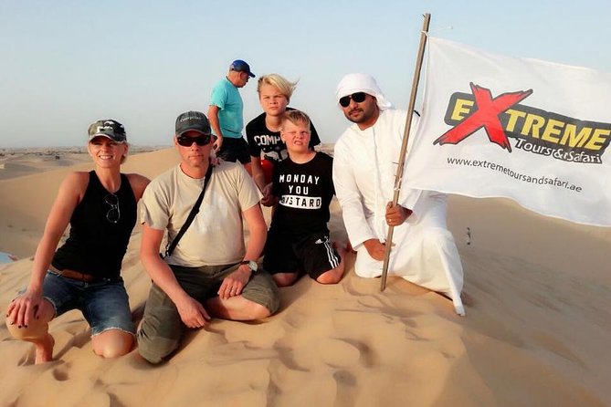 Abu Dhabi: 7-Hours Desert Safari with BBQ, Camel Ride & Sandboarding - First Stop: Pickup, Desert Timing, and the Al Khaznah Run