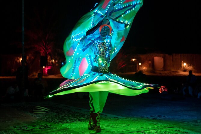 Abu Dhabi: 7-Hours Desert Safari with BBQ, Camel Ride & Sandboarding - Dressing Up in the Desert: Henna, Costumes, Falcons, and Quick Photo Moments