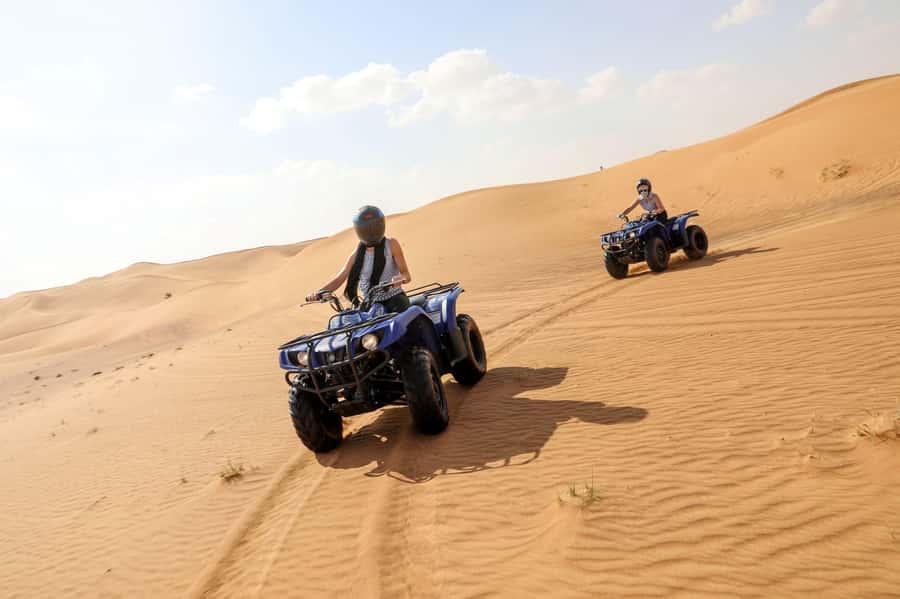 Abu Dhabi: Desert Safari, Quad Bike, Camels & Sandboarding - Getting to the desert: pickup, timing, and what the ride feels like