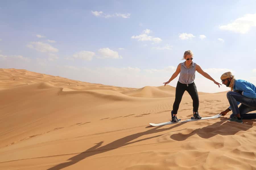 Abu Dhabi: Desert Safari, Quad Bike, Camels & Sandboarding - Sandboarding in the dunes: gear, shoes, and what to aim for
