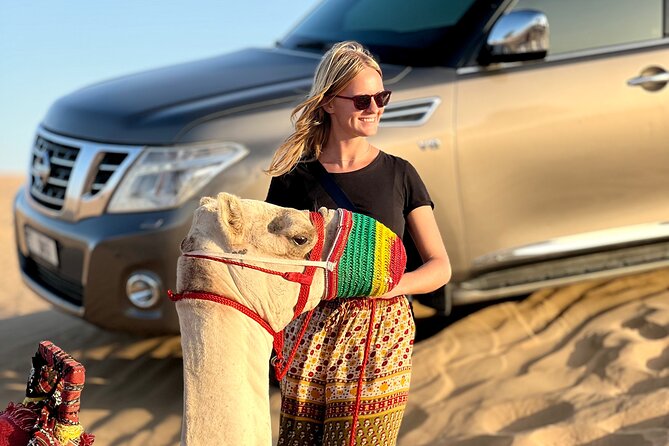 Abu Dhabi Desert Safari Tour with Shows & Buffet Dinner - Dune Bashing and Sandboarding at Al Ajban