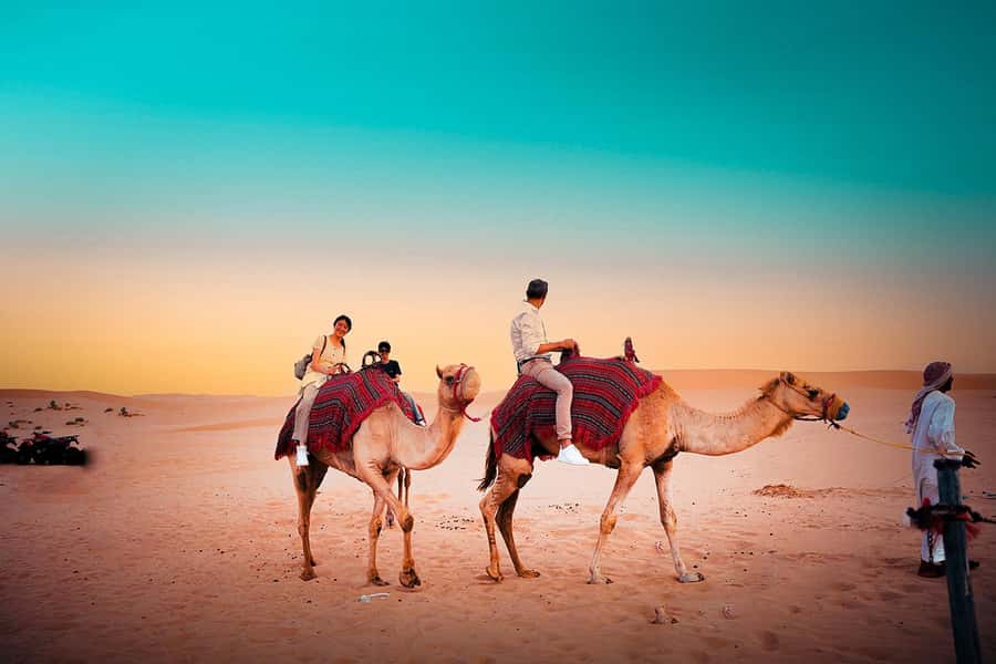 Abu Dhabi: Desert Safari with BBQ, Belly & Tannura Dance - Bedouin camp welcome: coffee, dates, falafel, and a real evening shift