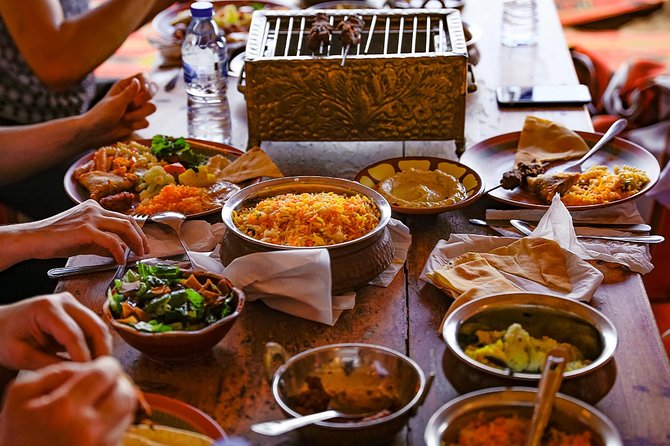 Abu Dhabi: Desert Safari with BBQ, Camel Ride & Sandboarding - Traditional dance shows: Tanoura and belly dancing under the night sky