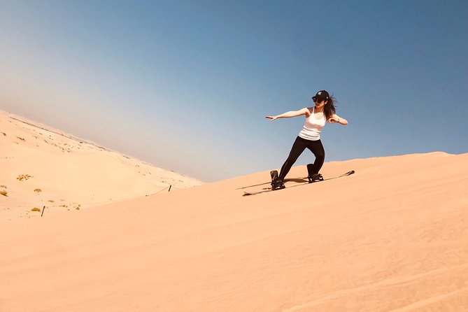 Abu Dhabi Desert safari with BBQ Dinner,Sandboarding & Camel ride - From Pickup to Dune Bashing: Why the Timing Works