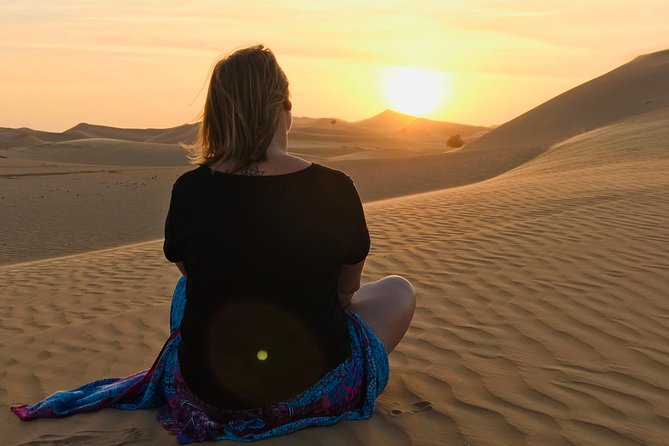 Abu Dhabi Desert safari with BBQ Dinner,Sandboarding & Camel ride - Camel Farm Stop: A Calm Break Before Sunset Energy