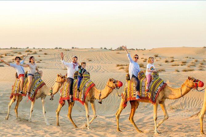 Abu Dhabi Desert Safari with Live Entertainment and Live BBQ - Bedouin-style camp: camel rides, sandboarding, and sunset time