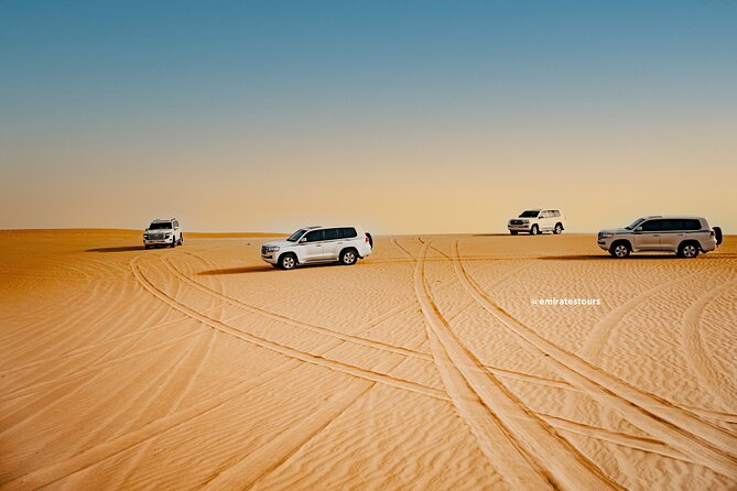Abu Dhabi Evening Desert Safari BBQ, Camel Ride, Entertainments - Sandboarding at the camp: fun, but protect your energy