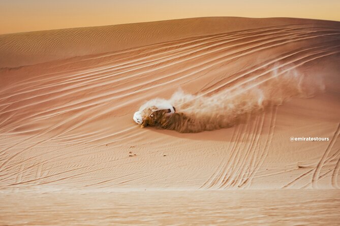 Abu Dhabi Evening Desert Safari BBQ, Camel Ride, Entertainments - Dune bashing: fast sand, real skills, and safety as the focus