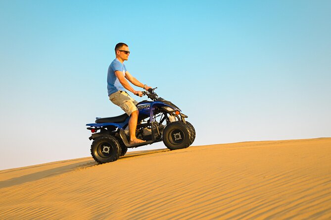 Abu Dhabi Evening Desert Safari - Dune bashing Camel ride and BBQ - Desert Camp Arrival: BBQ Dinner Under the Stars