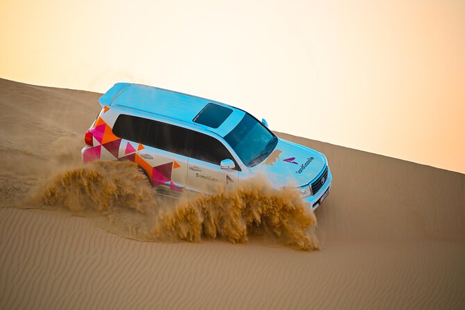 Abu Dhabi Evening Desert Safari - Private car Dune bashing & BBQ - From Abu Dhabi city lights to dune speed: the timing you’ll feel