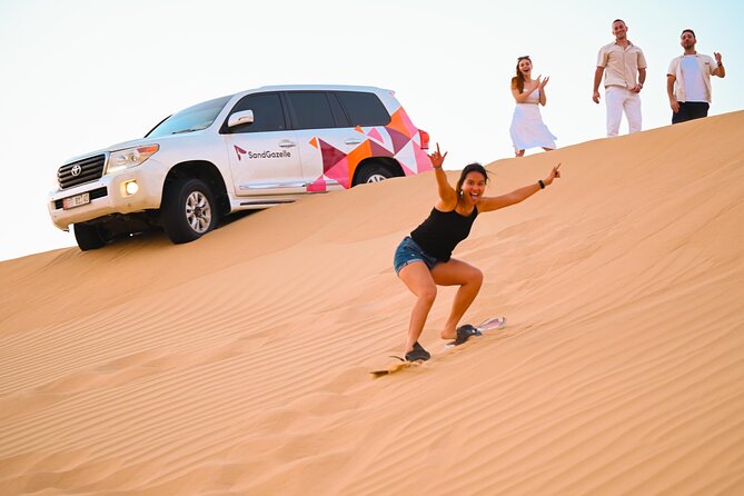 Abu Dhabi Evening Desert Safari - Private car Dune bashing & BBQ - Desert camp dinner, shows, and shisha: the full evening payoff