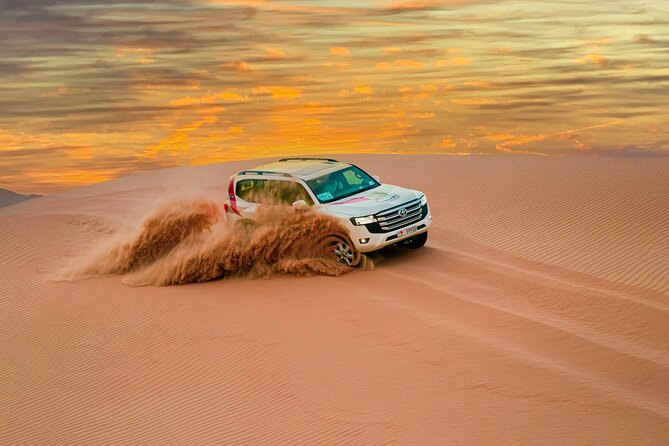 Abu Dhabi Morning Desert Safari: 4x4 Dune Bashing, Camel Ride and Sandboarding - 4x4 Dune Bashing: Fast, Swoopy, and Not for Everyone