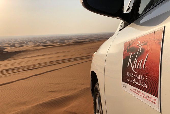 Abu Dhabi morning desert safari - Private car - Sandboarding on the dunes: adrenaline with instant payoff