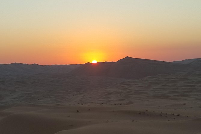 Abu Dhabi: Sunrise Desert Safari Experience - Hotel pickup, the 4x4 ride, and how it feels before sunrise