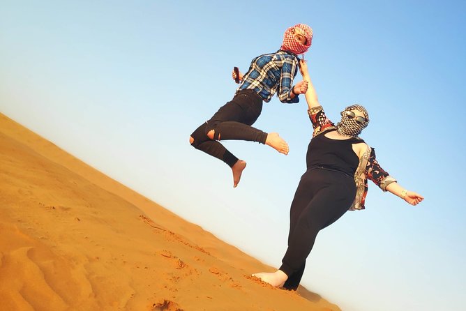 Afternoon Dune Drive Safari with SunSet Photo & Sand Boarding - Sandboarding and Camel Riding: Included Desert Sports, Not Just a Photo Op