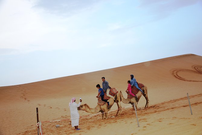 Al Ain Desert Safari with Buffet Dinner - Fire and belly dance plus buffet dinner: what to expect at camp