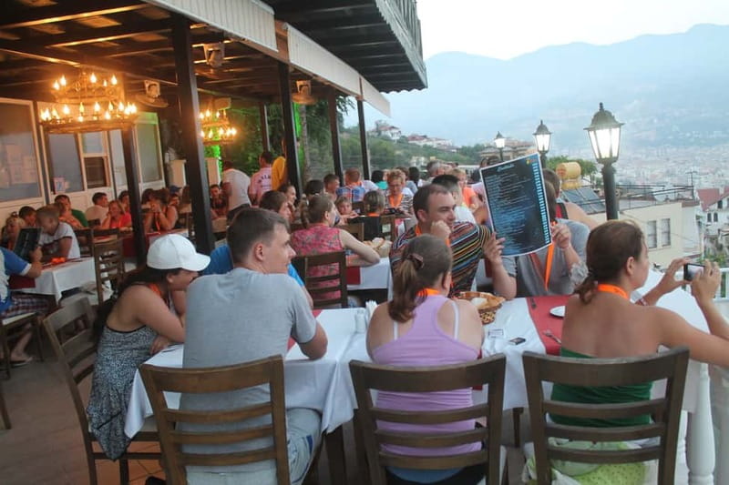 Alanya: Sunset Night Safari with Boat Trip with Dinner - Damlatas Caves and the landmark trail: fun stops, but don’t expect a long visit