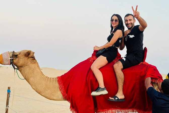 Arabian Desert Safari Abu Dhabi: 6Hour Tour with BBQ & Live Shows - Camel Photos, Sandboarding, Shisha, and Henna: How to Make It Worth It