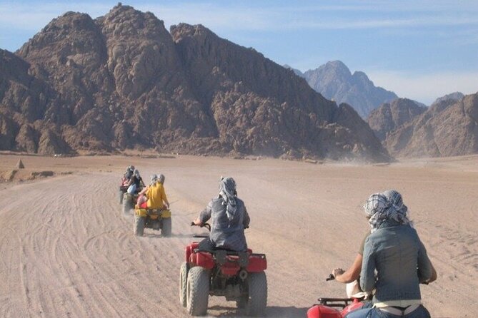 ATV Quad bike Adventure Desert Safari Tour In Sharm El Sheikh - The Photo Situation: Separate Photographer, Real-World Pressure to Buy