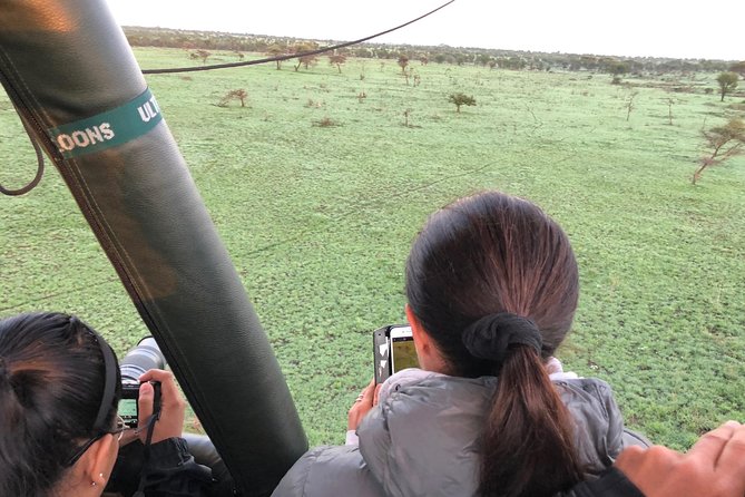 Balloon Safari & Bush Breakfast in Serengeti - Miracle Experience - The landing celebration: toast first, questions later