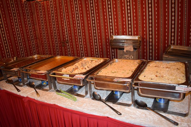 Classic Dubai Desert Safari with BBQ Dinner and Camp activities - Desert Camp at Sunset: Camel Rides, Sandboarding, and Henna