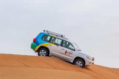Classic Dubai Desert Safari with BBQ Dinner and Camp activities - Dune Bashing in a 4x4: The Jolt, the Safety, and What to Wear