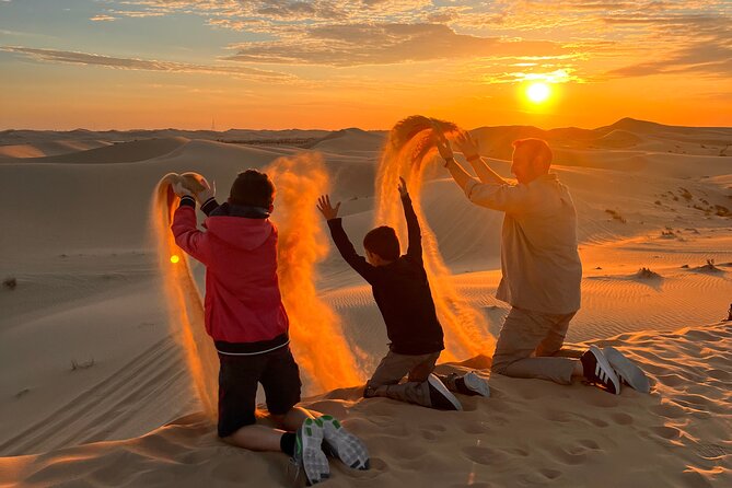Desert Safari Abu Dhabi w/ Sand Boarding, Camel Ride & BBQ Dinner - Getting to Al Khatim Desert: your afternoon start in Abu Dhabi