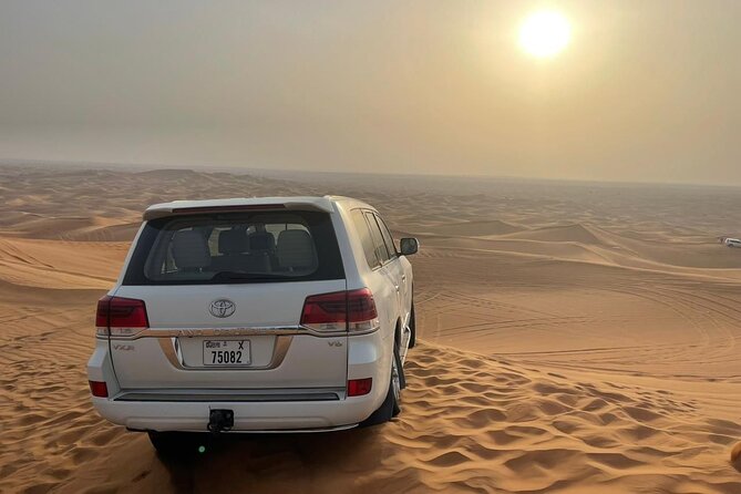 Desert safari adventure with BBQ dinner - Camp activities and live shows: henna, attire photos, and performance time