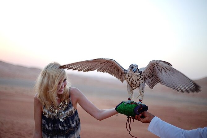 Desert Safari and Quad Bike Experience in Dubai with Dinner - Camel Ride and Sandboarding: Two Desert Traditions, One Camp