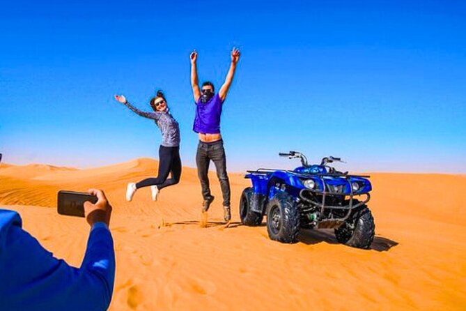 Desert Safari Dubai 30 Mins Quad Bike, Sand Board, Camel Ride BBQ - Camp Dinner With Unlimited Drinks and Live Fire Shows