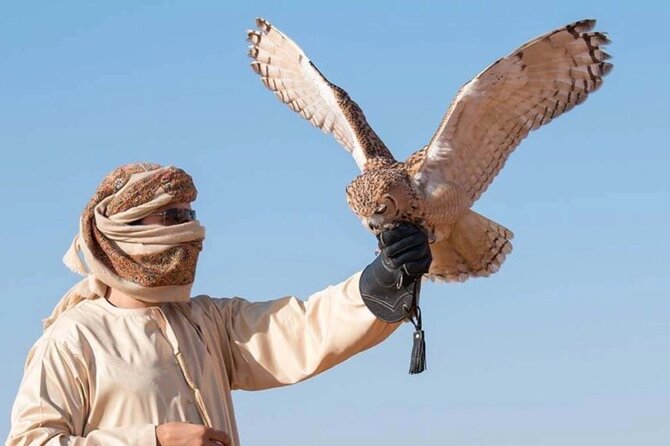 Desert Safari Dubai Sand Bashing, Camel Ride, Shows, Live BBQ - Camel ride, sandboarding, and henna at the desert camp