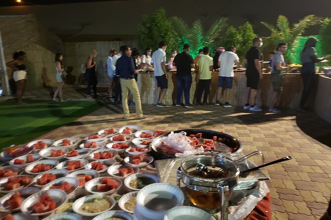 Desert Safari Dubai with Buffet Dinner & 3 live shows - Bedouin Camp Evening: Camel Ride, Shisha, Henna, and Costume Photos