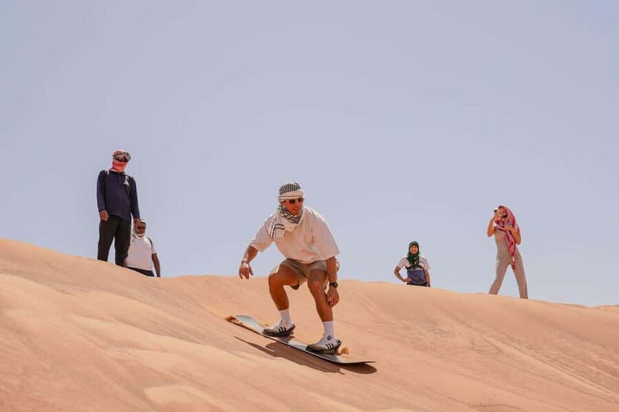 Desert Safari Dubai with Camel Ride, Sandboarding & Dinner - Lahbab Desert: quad riding that starts with safety, then turns into fun