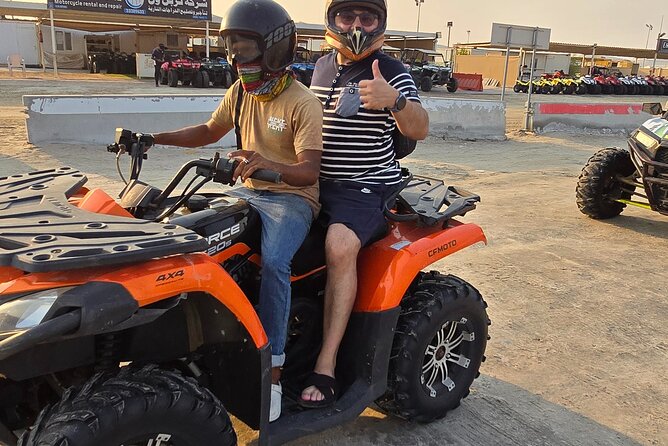 Desert Safari, Quad Bike, Sandboarding and Camel Ride - The Real Appeal: More Than One Kind of Desert Fun