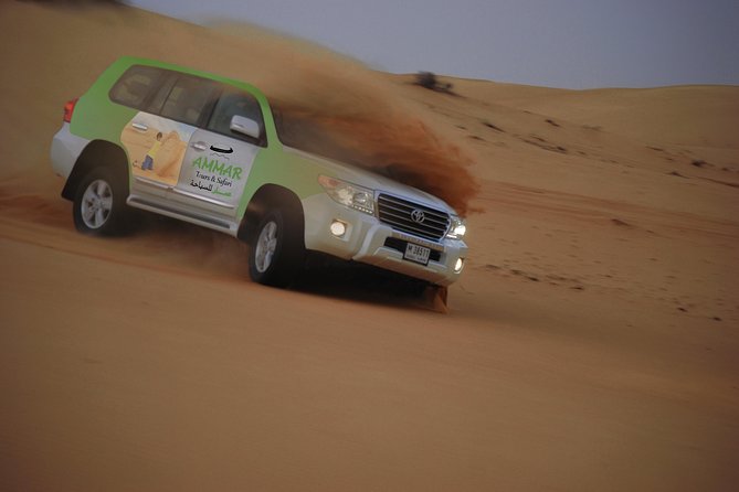 Desert Safari Tour, Quad Bike with BBQ Dinner & Show from Dubai - From Dubai hotels to the high dunes in an air-conditioned Land Cruiser