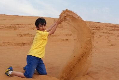 Desert Safari Tour, Quad Bike with BBQ Dinner & Show from Dubai - Sandboarding and the sunset photo stop: when the desert looks its best