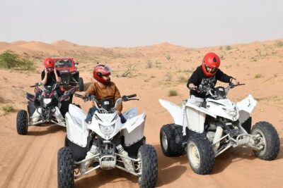 Desert Safari W/BBQ Dinner, Quad Bike, Camel Ride, & Sandboarding - Dune bashing: adrenaline sand driving with a steady hand