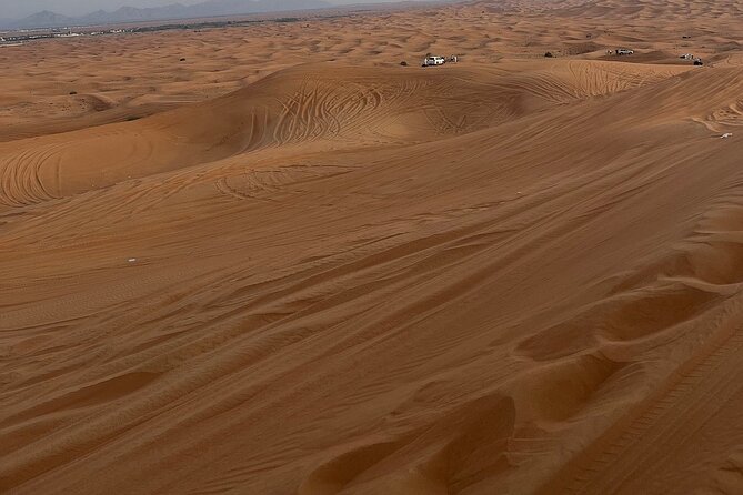 Desert Safari with 30 minutes Buggy Ride with Camel Ride & Dinner - The 3pm Pickup and Air-Conditioned Drive That Sets the Tone