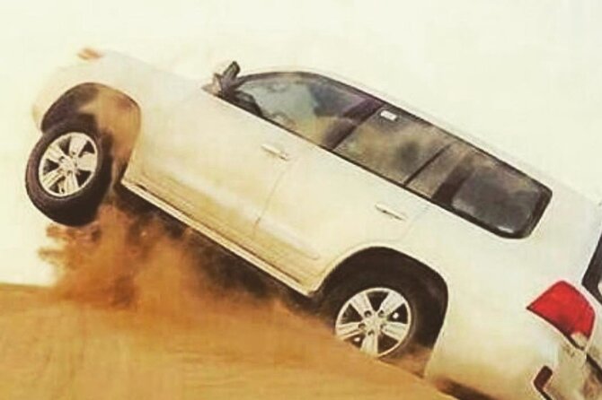 Desert Safari With BBQ Dinner, Quad Bike & Camel Ride from Dubai - First hit of the desert: pickup to the Lahbab dunes