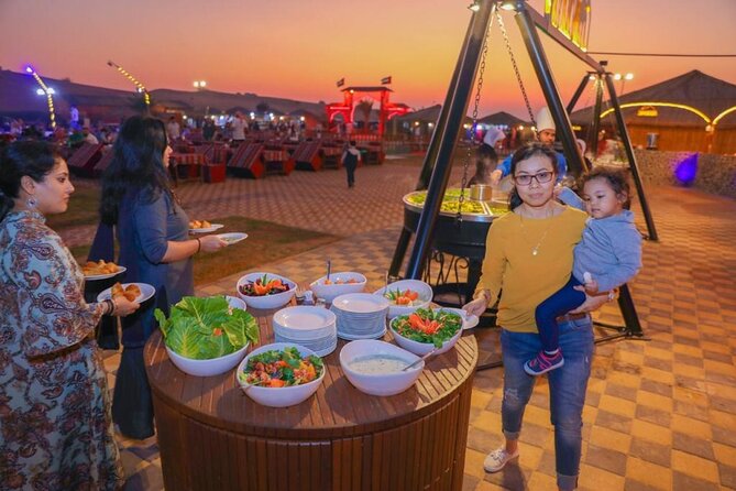Desert Safari With BBQ Dinner, Quad Bike & Camel Ride from Dubai - Camel ride + Arabic attire + small details that make it feel real