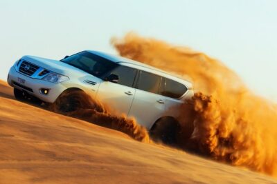 Desert Safari with Camel Ride, Sand Boarding & Inland Sea Tour in Doha - The 4x4 Land Cruiser Dune Bashing: Fun, Motion, and Safety Focus