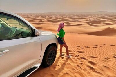 Desert Safari with Quad Bike Camel ride ,SandBoarding ,InalndSea - Where You Start: National Museum Metro Station Convenience