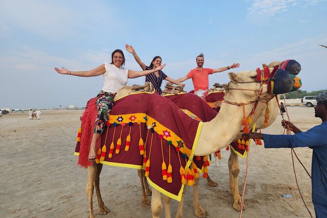 Desert Safari with Sandboarding and Inland Sea Private Tour - Sealine Beach stop: camel options and a short reset