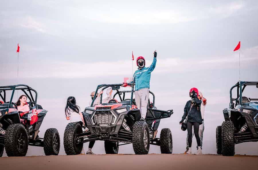 Doha: ATV Quad Bike and Buggy Desert Safari with Camel Ride - 4WD Toyota dune bashing: speed, stops, and the best photo angles