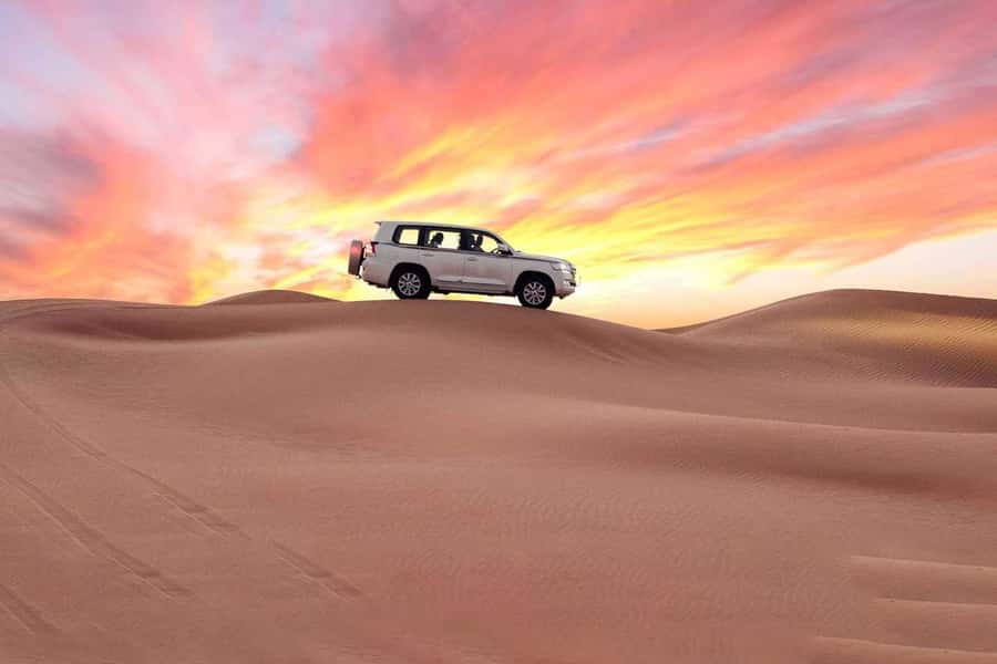Doha: Combo City Tour and Desert Safari with Camel Ride - Mesaieed desert safari: camel ride, dune bashing, and sand sliding